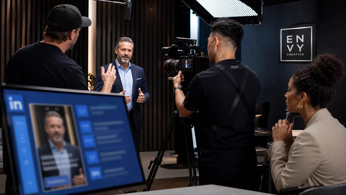 B2B executive filming a LinkedIn video with an Envy Creative production crew